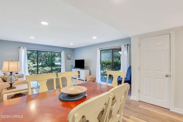 dining room with light wood-type flooring