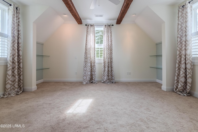 additional living space featuring lofted ceiling with beams, baseboards, and light colored carpet