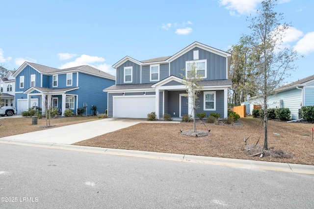 view of front of property with a garage, concrete driveway, and board and batten siding