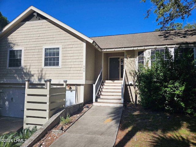 view of front of home with a garage