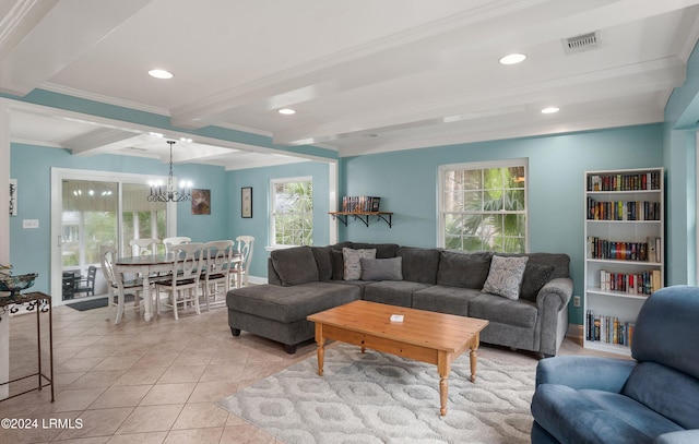 living room featuring beamed ceiling, crown molding, light tile patterned floors, and a chandelier