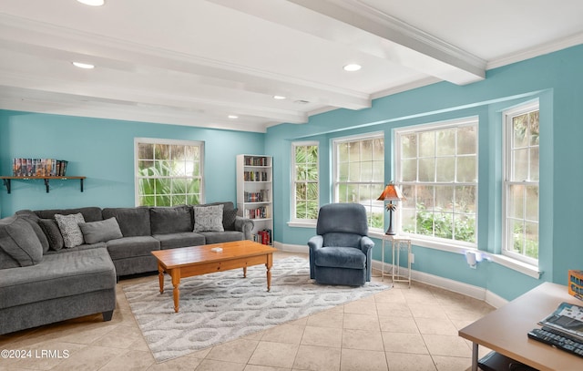 living room featuring beamed ceiling, ornamental molding, light tile patterned floors, and plenty of natural light