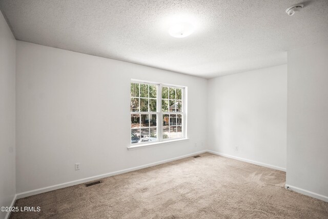 120B Tamara Ln, Port Royal, SC 29935 - carpeted spare room featuring a textured ceiling