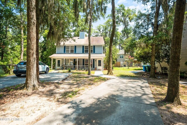 120B Tamara Ln, Port Royal, SC 29935 - view of front of property featuring a porch and a chimney
