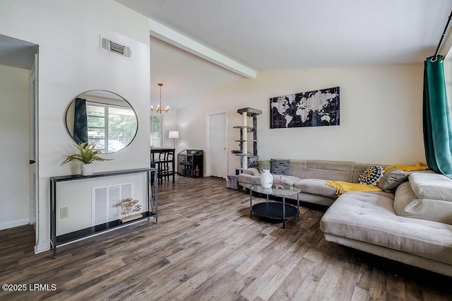 living area with wood finished floors and a chandelier