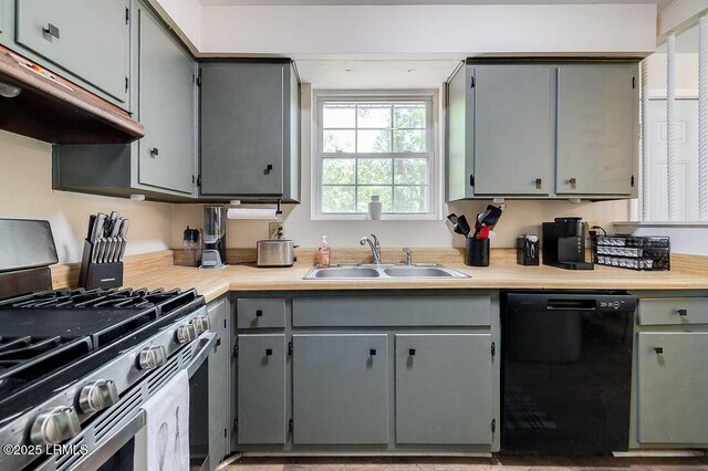 12408 Deerfield Rd, Savannah, GA 31419 - kitchen with stainless steel range with gas cooktop, black dishwasher, a sink, under cabinet range hood, and gray cabinetry