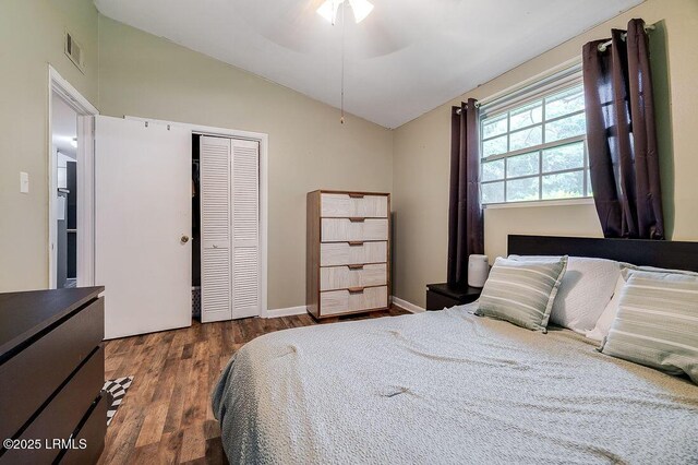 12408 Deerfield Rd, Savannah, GA 31419 - bedroom featuring wood finished floors, vaulted ceiling, a closet, baseboards, and ceiling fan