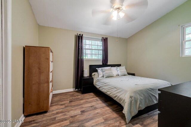 12408 Deerfield Rd, Savannah, GA 31419 - bedroom featuring vaulted ceiling, wood finished floors, baseboards, and ceiling fan
