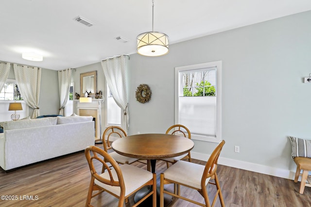39 Barrington Ave, Bluffton, SC 29910 - dining area with baseboards, visible vents, and wood finished floors