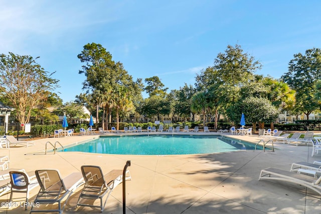 39 Barrington Ave, Bluffton, SC 29910 - pool featuring a patio and fence