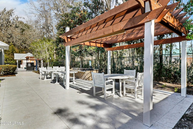 39 Barrington Ave, Bluffton, SC 29910 - view of patio / terrace featuring outdoor dining area, a pergola, and fence