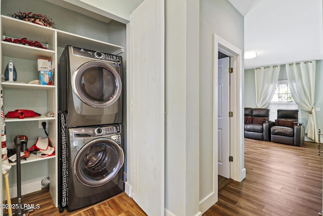39 Barrington Ave, Bluffton, SC 29910 - clothes washing area with wood finished floors, stacked washer and clothes dryer, and laundry area