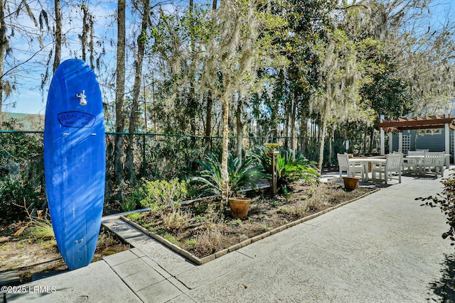 39 Barrington Ave, Bluffton, SC 29910 - view of home's community featuring fence, a pergola, and a patio area