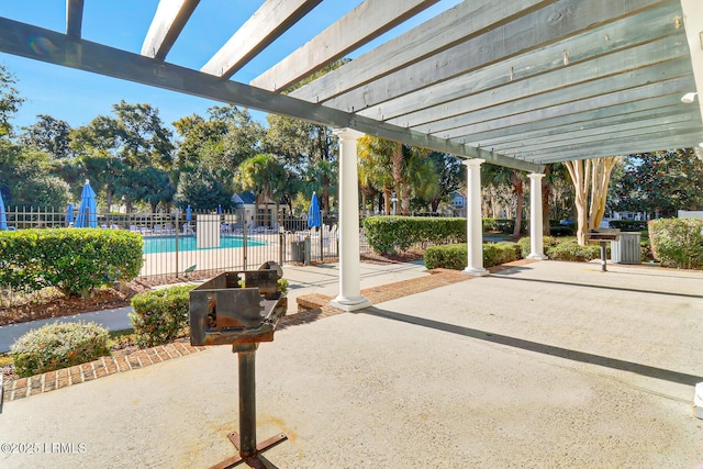 39 Barrington Ave, Bluffton, SC 29910 - view of patio featuring a pergola, a community pool, and fence