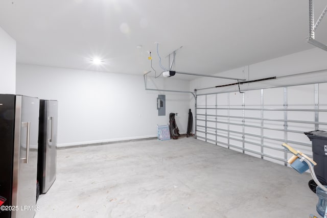 garage featuring stainless steel refrigerator, a garage door opener, and electric panel