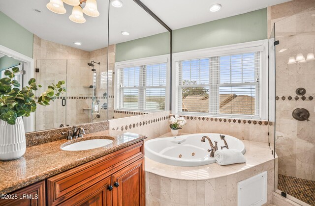 54 Battery Creek Club Dr, Beaufort, SC 29902 - full bath with plenty of natural light, vanity, a whirlpool tub, and a shower stall