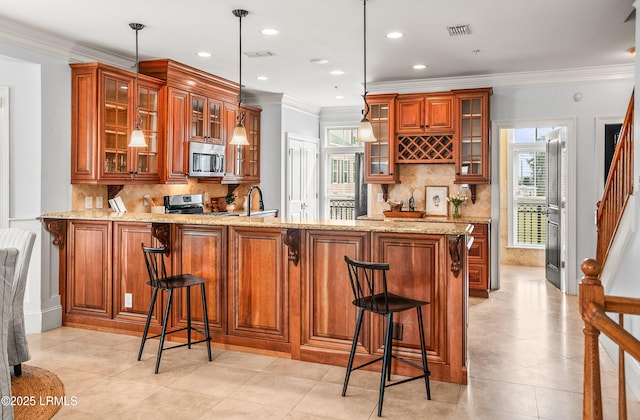 54 Battery Creek Club Dr, Beaufort, SC 29902 - bar featuring visible vents, appliances with stainless steel finishes, pendant lighting, and ornamental molding