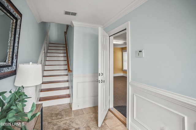 54 Battery Creek Club Dr, Beaufort, SC 29902 - staircase with tile patterned floors, visible vents, and ornamental molding