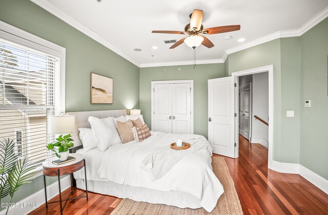 54 Battery Creek Club Dr, Beaufort, SC 29902 - bedroom with visible vents, ornamental molding, wood finished floors, a closet, and baseboards