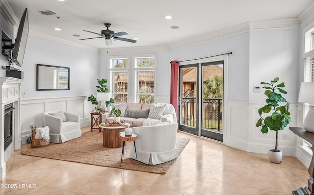 54 Battery Creek Club Dr, Beaufort, SC 29902 - living area with crown molding, visible vents, and ceiling fan