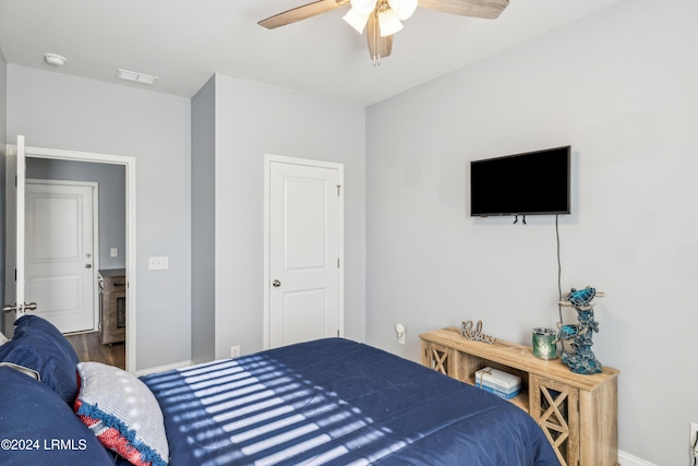 bedroom featuring hardwood / wood-style floors and ceiling fan