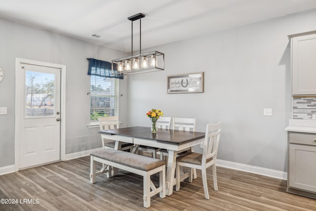 dining area with light hardwood / wood-style flooring