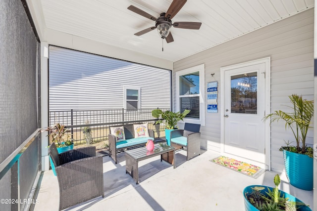 sunroom / solarium with ceiling fan