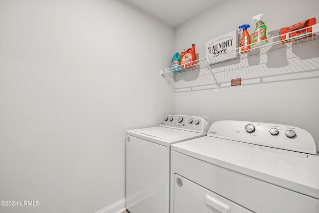 laundry room with independent washer and dryer