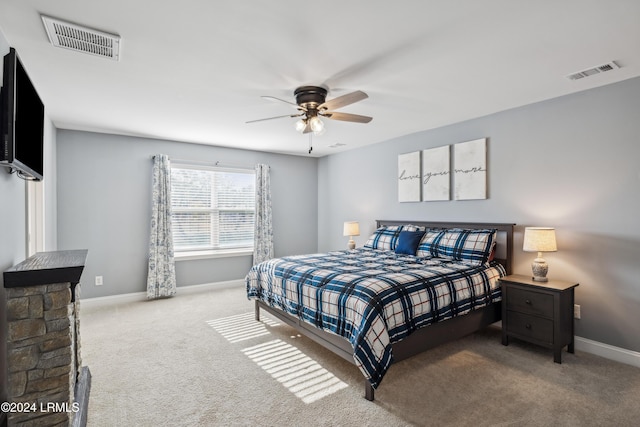 bedroom with ceiling fan and carpet