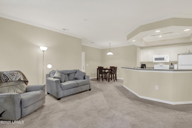 living area with light carpet, baseboards, and crown molding