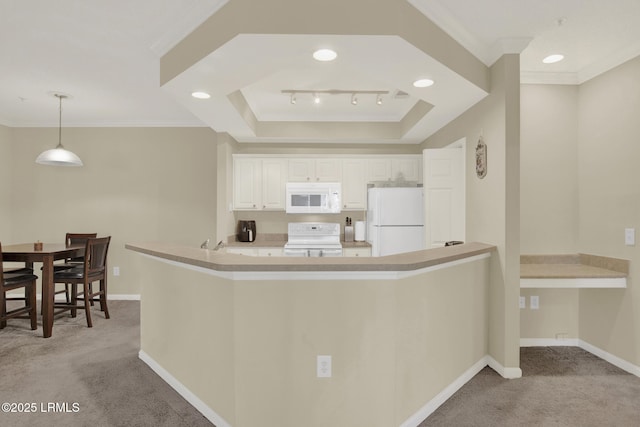 kitchen with baseboards, white appliances, crown molding, and light colored carpet