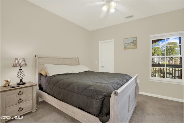 bedroom featuring baseboards, visible vents, ceiling fan, and light colored carpet