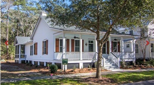 view of front of property with ceiling fan and covered porch