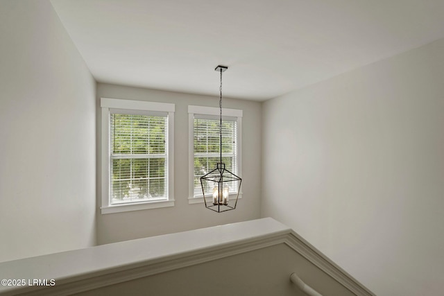 interior space with an inviting chandelier