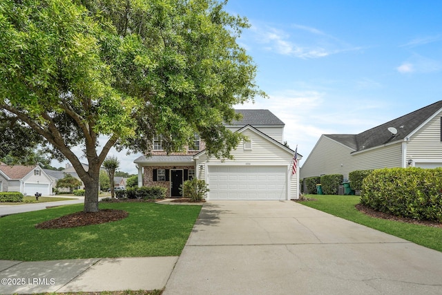 view of front of home with driveway, a front yard, and a garage