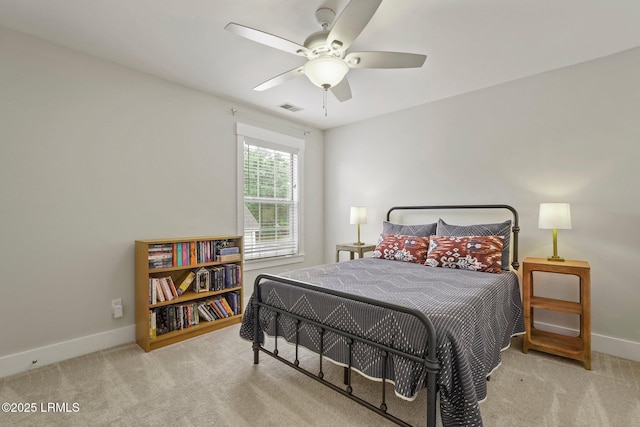 bedroom with a ceiling fan, visible vents, carpet floors, and baseboards