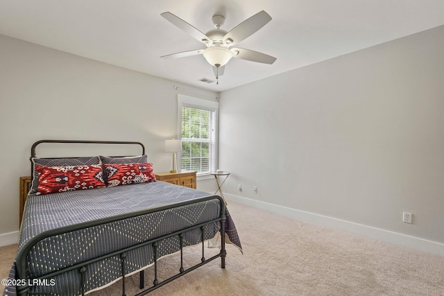 bedroom with a ceiling fan, visible vents, carpet, and baseboards