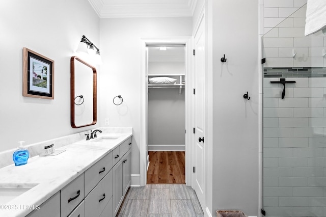 7 Canton Row, Beaufort, SC 29906 - full bathroom featuring double vanity, ornamental molding, tiled shower, and a spacious closet