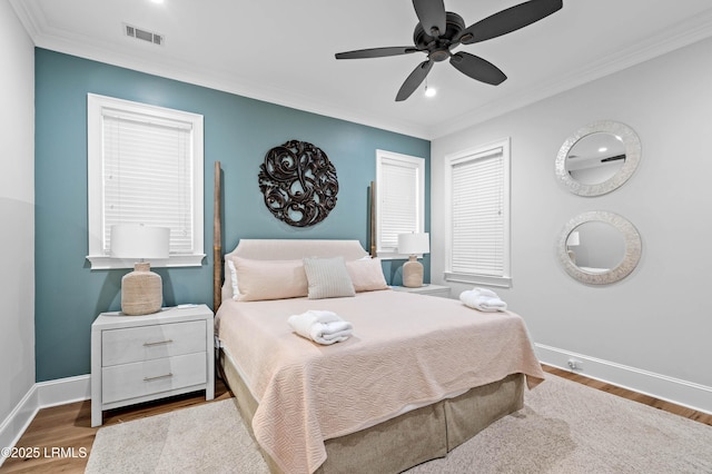 7 Canton Row, Beaufort, SC 29906 - bedroom with wood finished floors, crown molding, a ceiling fan, and recessed lighting