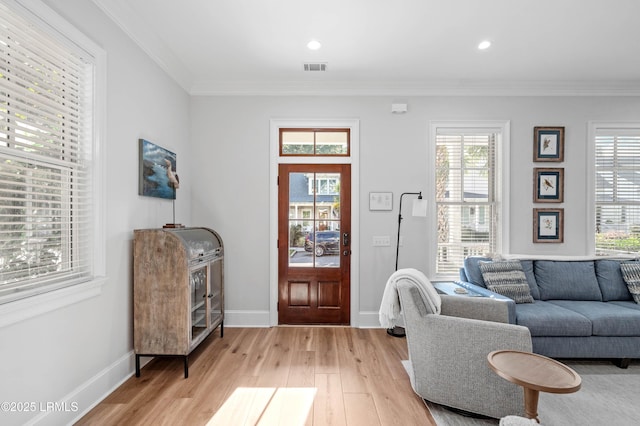 7 Canton Row, Beaufort, SC 29906 - foyer entrance with light wood-style flooring, crown molding, and recessed lighting