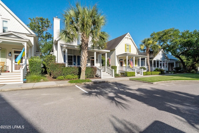 7 Canton Row, Beaufort, SC 29906 - view of front facade with covered porch and a chimney