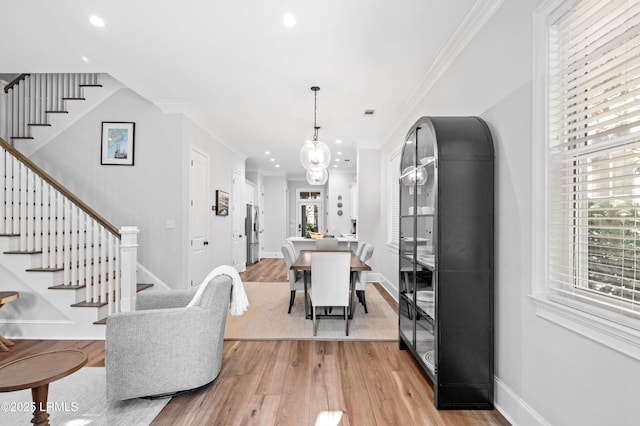7 Canton Row, Beaufort, SC 29906 - dining space with stairway, light wood-style flooring, recessed lighting, and ornamental molding