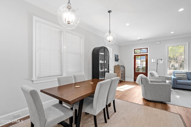 7 Canton Row, Beaufort, SC 29906 - dining space featuring light wood-type flooring, crown molding, and recessed lighting