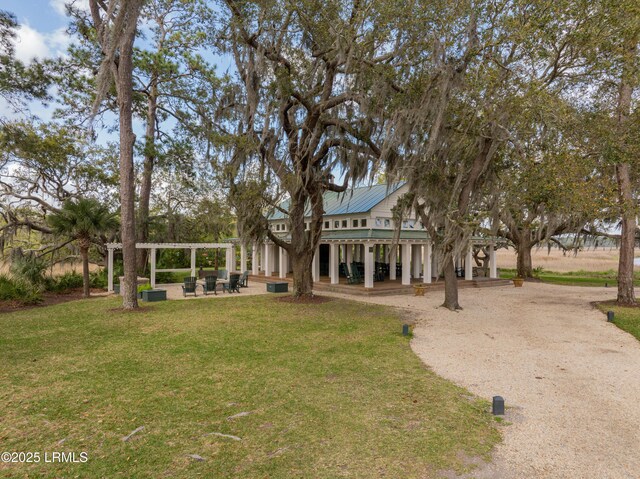 7 Canton Row, Beaufort, SC 29906 - rear view of property with a lawn and a patio