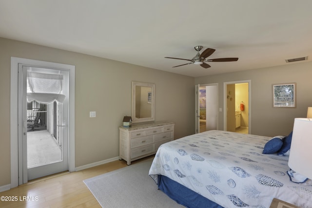 71 Skull Creek Dr Unit A302, Hilton Head Island, SC 29926 - bedroom with light wood-style flooring, access to exterior, ceiling fan, and connected bathroom