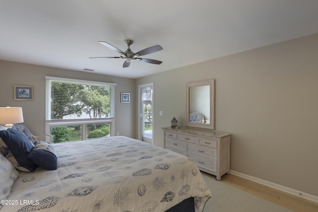 71 Skull Creek Dr Unit A302, Hilton Head Island, SC 29926 - bedroom featuring baseboards and a ceiling fan