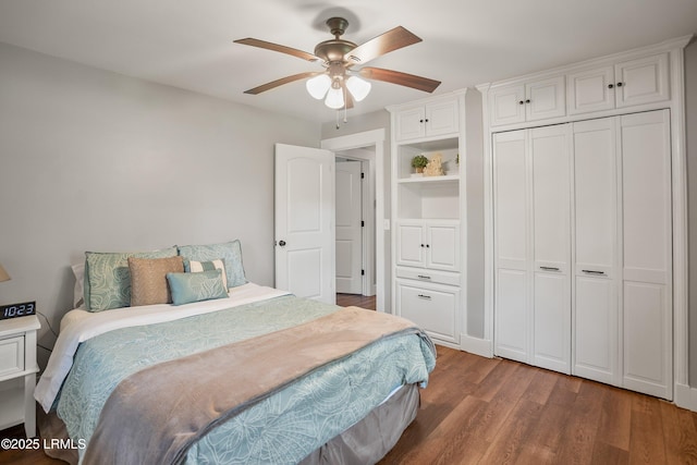 702 Center Dr W, Beaufort, SC 29902 - bedroom featuring wood finished floors, a ceiling fan, and a closet