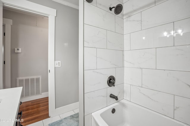 702 Center Dr W, Beaufort, SC 29902 - bathroom with crown molding,  shower combination, vanity, and baseboards