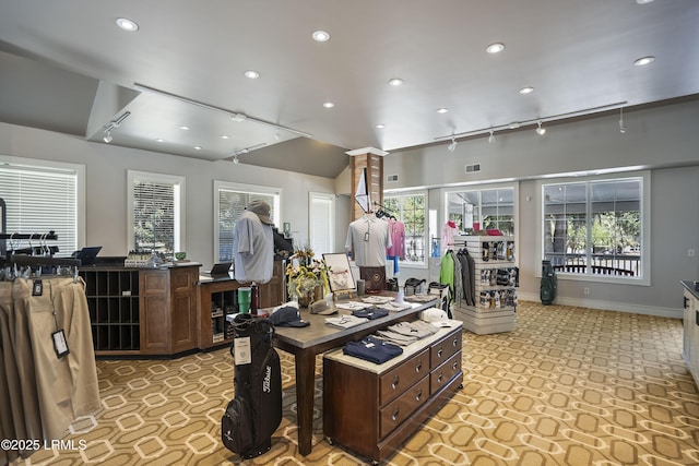 office space featuring recessed lighting, baseboards, and visible vents