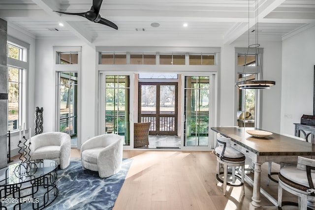 sunroom / solarium with beamed ceiling